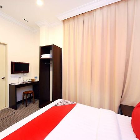 Oyo 750 Comfort Hotel Кота-Кинабалу Экстерьер фото
