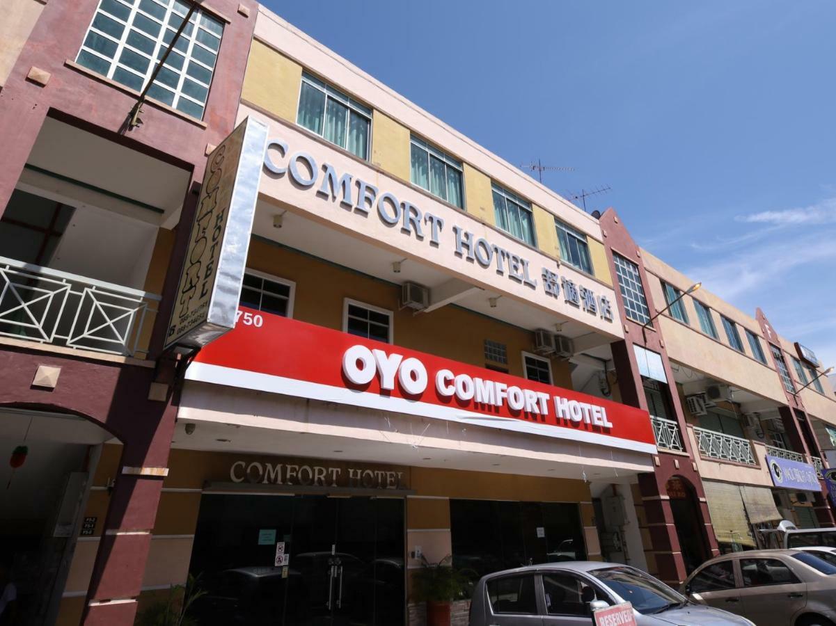 Oyo 750 Comfort Hotel Кота-Кинабалу Экстерьер фото