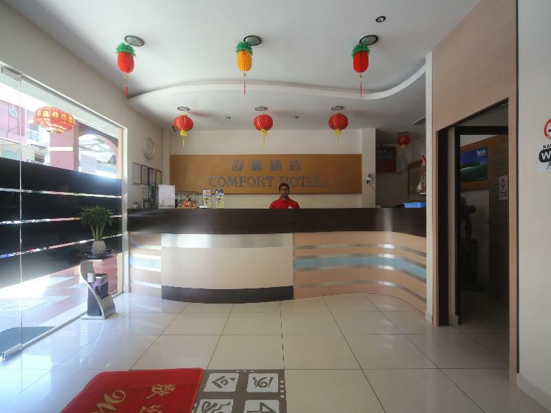 Oyo 750 Comfort Hotel Кота-Кинабалу Экстерьер фото